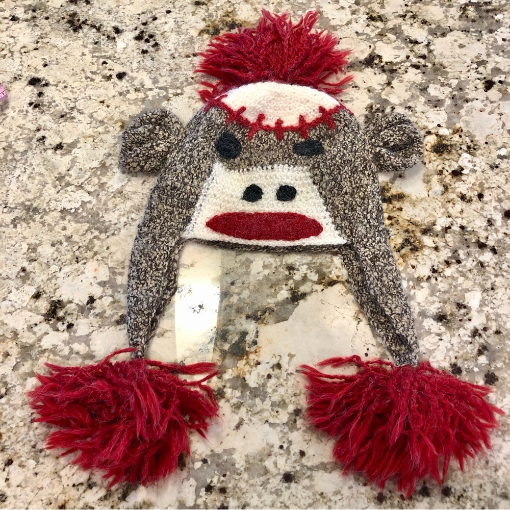 PERUVIAN TRADING CO sock monkey winter hat. Never worn. EXCELLENT cond